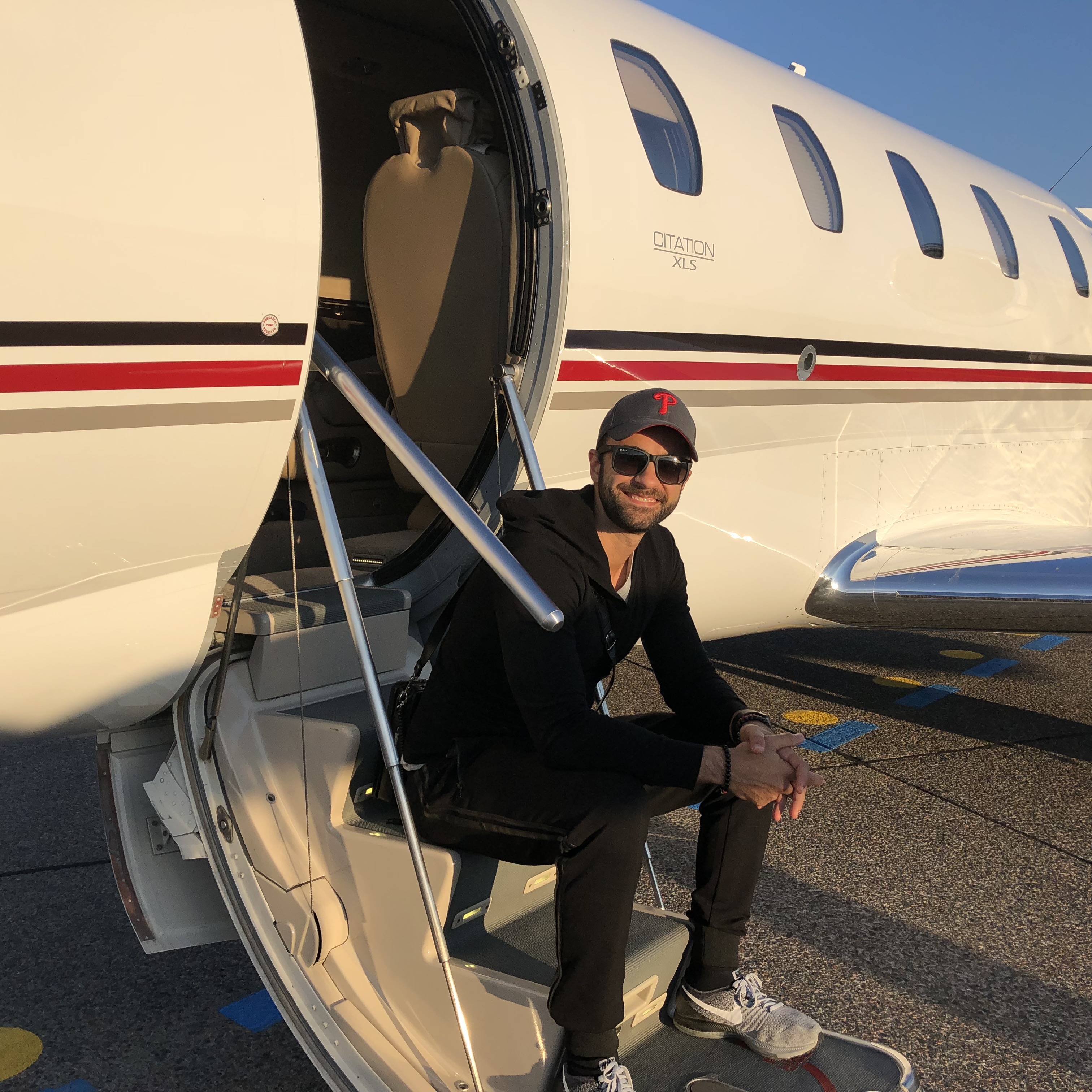 Andrea d'Agostini boarding a private jet