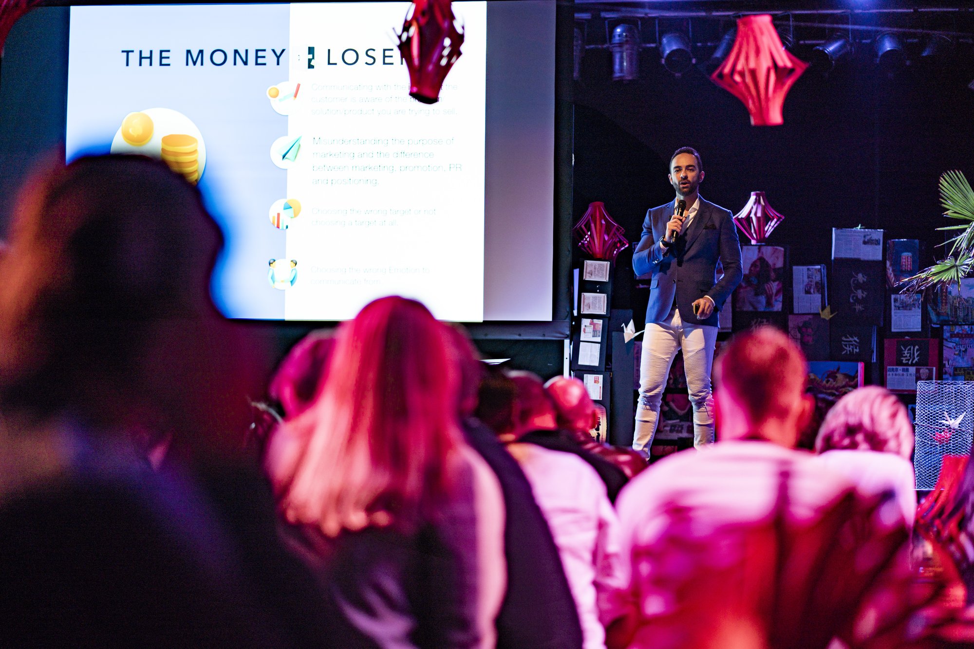 Andrea d'Agostini teaching Money The Game to a live audience