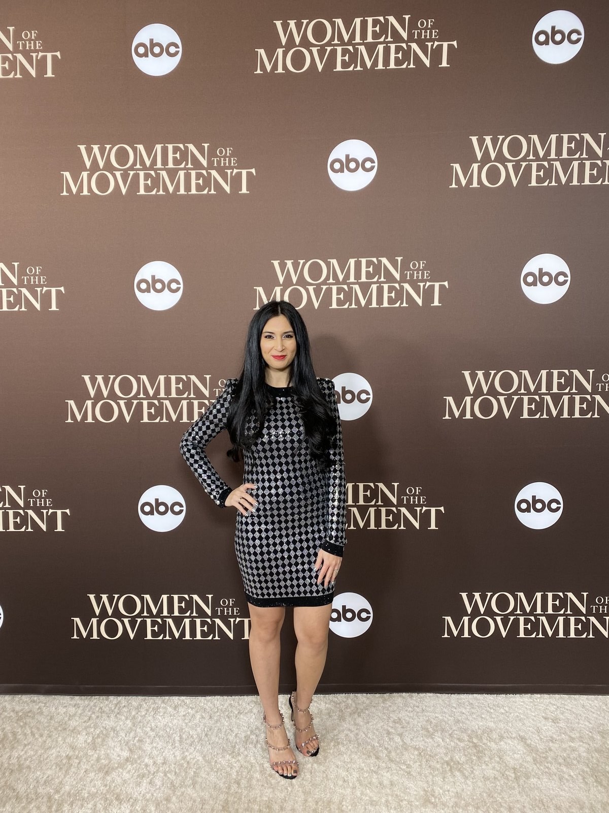 Nicole Tabs on the Women of the Movement press wall